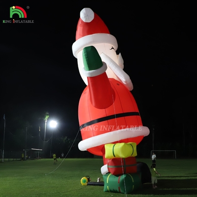 Glowing Inflatable Santa Claus Ornament 33ft Kartun Raksasa dengan Lampu LED untuk Natal Taman Pesta Dekorasi