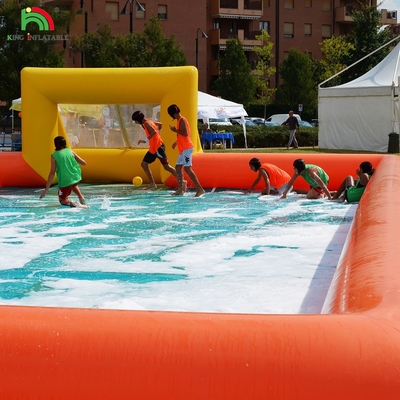 Pabrik disesuaikan PVC Inflatable Football Playground Inflatable Football Field untuk permainan olahraga di luar ruangan