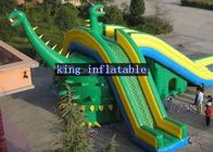 Luar ruangan Hijau / Kuning Dinosaurus Inflatable PVC Tarpaulin Dry Slide Disesuaikan