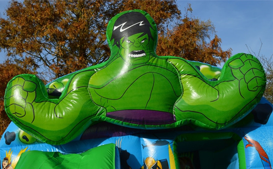 Anak-anak Inflatable Green Super Heroes Castle Jumping House Dengan Slide