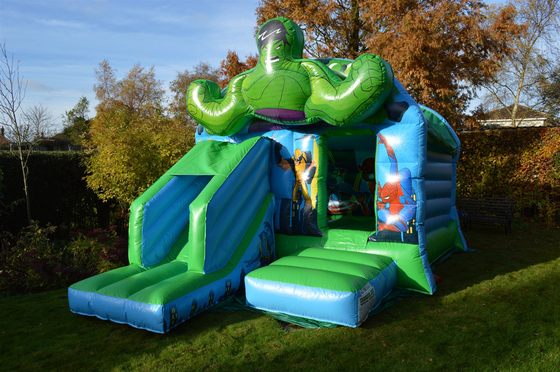 Anak-anak Inflatable Green Super Heroes Castle Jumping House Dengan Slide